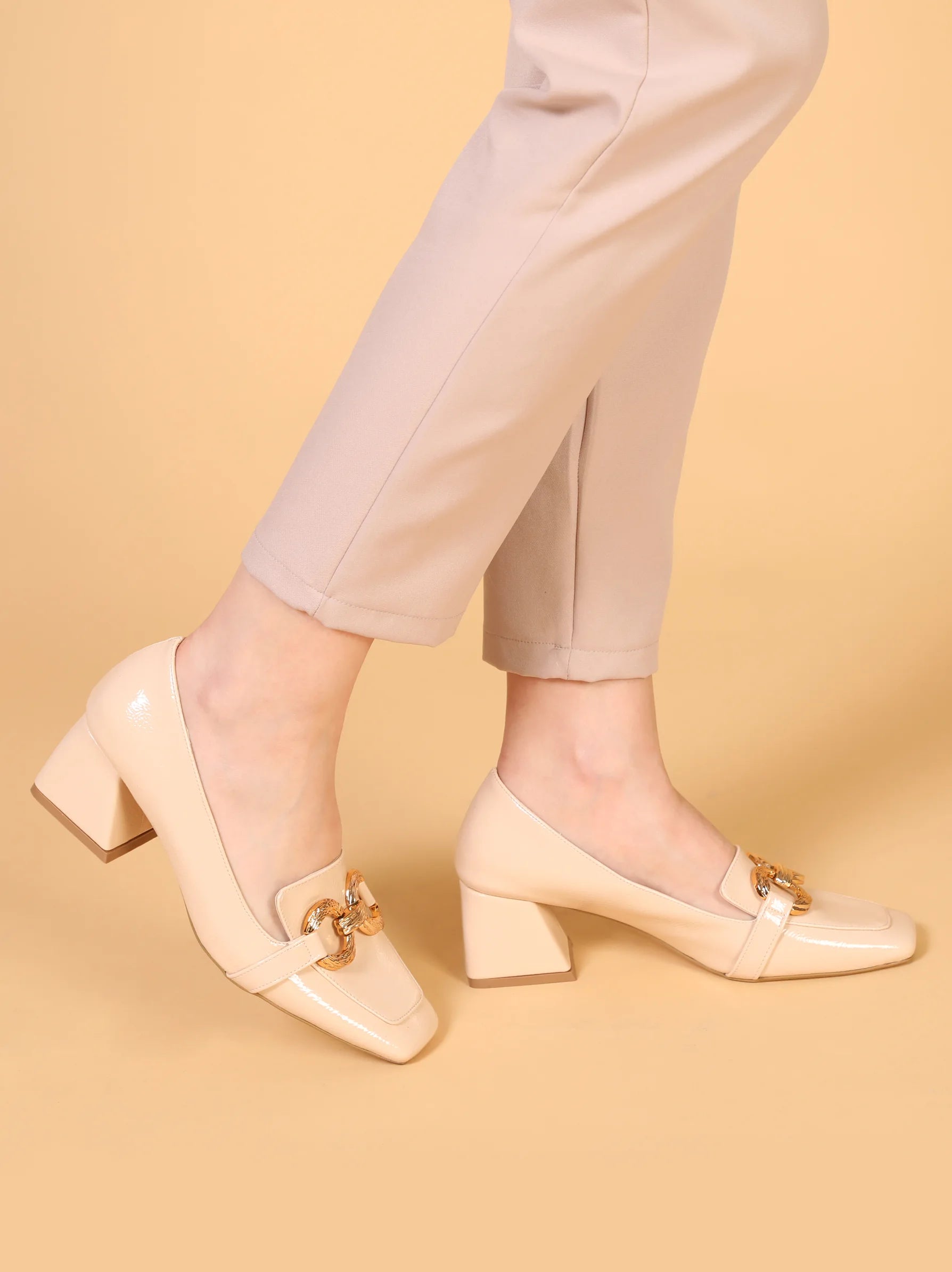 Gucci gold hotsell block heels