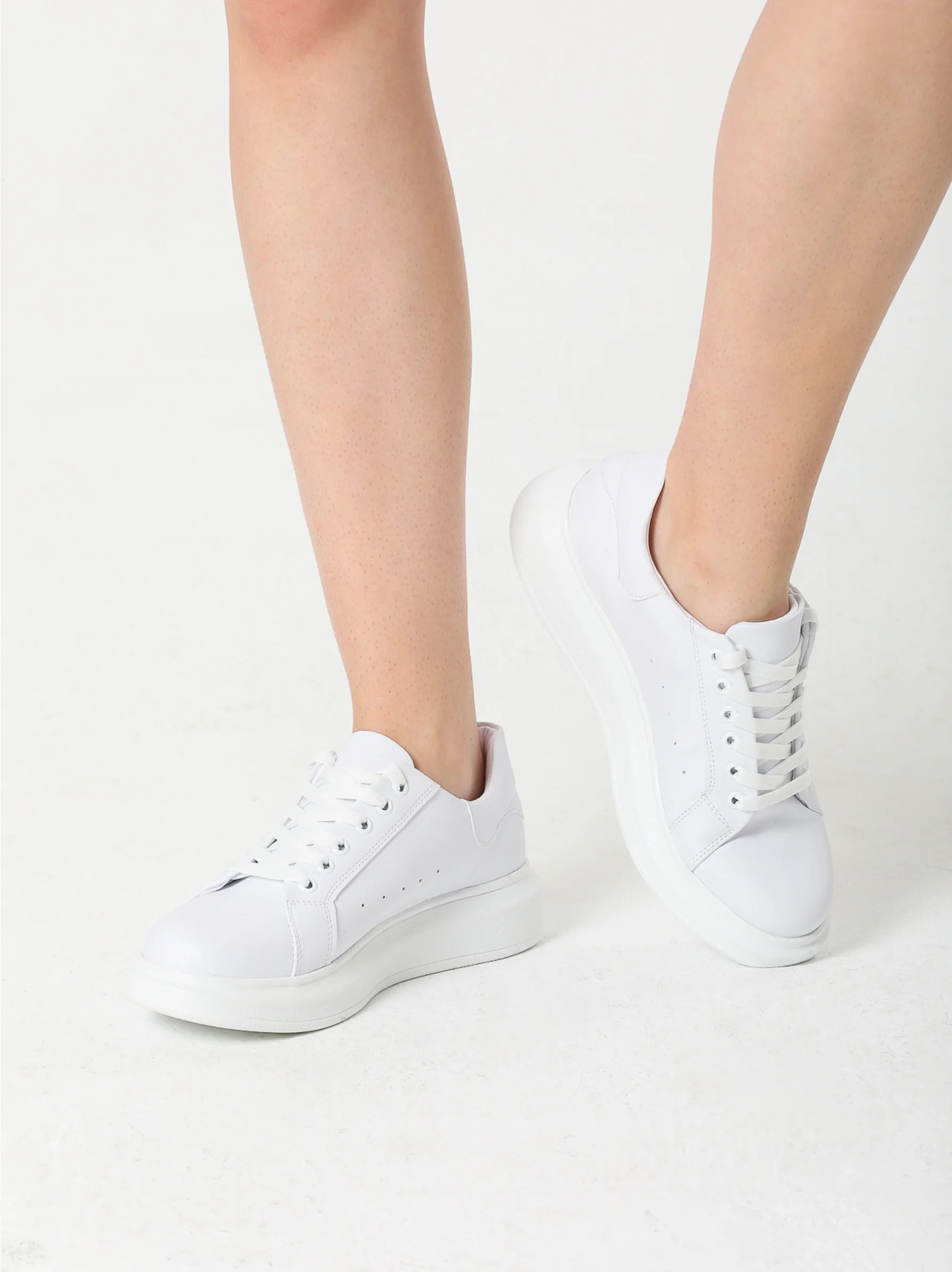 White flat trainers on sale womens